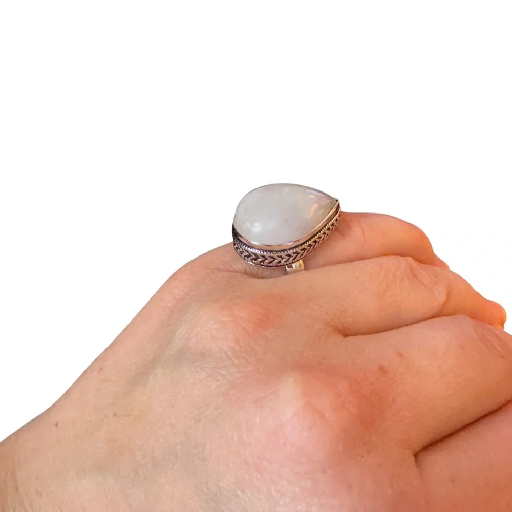 Milky white quartz teardrop stone in sterling silver setting size 6 925